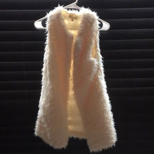 Faux fur pocketed vest- never worn!